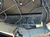 a keyboard and a mouse sitting on a desk