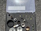 a tool kit in a plastic case on the ground
