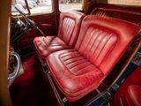 a red leather seat in the back of a car