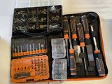 many different tools in the case on the table