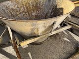 a large metal bowl sitting on top of a metal stand