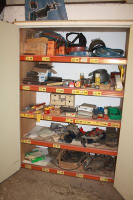 a closet full of assorted items in a garage