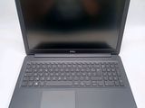 the dell laptop is open and ready to be used