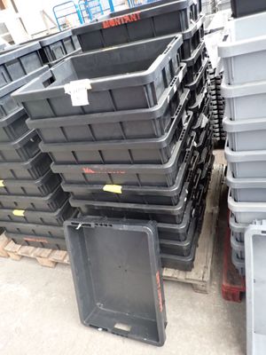 a lot of plastic containers stacked on top of each other