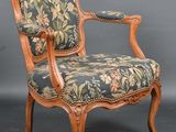an image of a chair with a floral upholstered seat