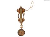 an image of a gold necklace with a clock on it