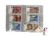 a picture of a set of five different currency notes