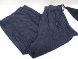 denim pants with drawstrings on a white surface