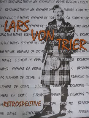 une affiche représentant un homme en kilt accrochée au mur