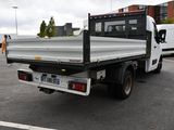 a white truck that is parked in a parking lot
