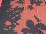 an image of a table cloth with flowers on it