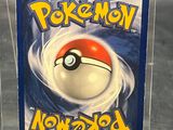 a plastic box with a pokemon card inside of it