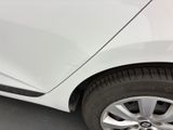a close up of a car ' s tire on the road