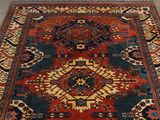 an image of a large oriental rug on the floor