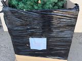 a black bag with a christmas tree inside of it