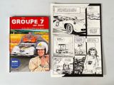 two books on the table with a drawing of a race car and a comic strip