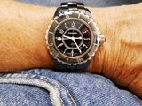 a person that is wearing a watch on his wrist
