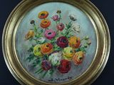 an oil painting of a bouquet of flowers in a gold frame