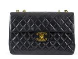 a chanel black quilted lambskin shoulder bag with gold hardware