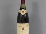 a bottle of wine that is sitting on a table
