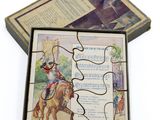 une boîte-énigme sur laquelle figure l'image d'un homme à cheval
