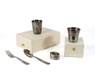 a silverware set on a white box with a fork and spoon