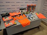 a table with a lot of items on it in front of a wall