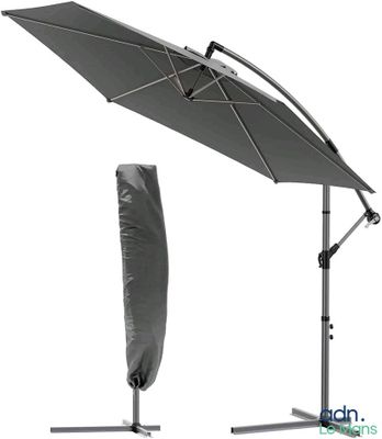 une image représentant un grand parapluie surmonté d'une housse