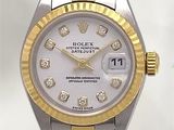 a rolex watch with diamonds on the dial
