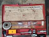 a tool set in a red case on the ground