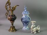 a lot of vases that are sitting on a table