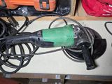 an image of a corded sander on a table