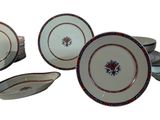 a lot of plates that are sitting on a table
