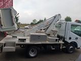 a white truck with a crane on the back of it