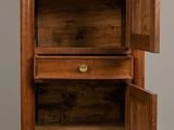 two wooden cabinets with doors open on each side of them
