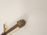 a knife that is laying on a table
