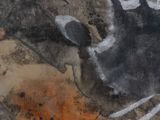a painting of a hand print on a wall