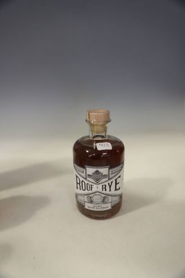 a bottle of liquor that is sitting on a table