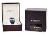 a box with a watch inside of it and a card in it