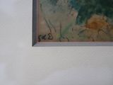 a picture of a painting hanging on the wall
