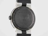 an image of a close up of a wrist watch on a white surface