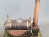 a small model of a steam engine on a table