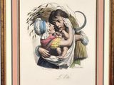 an old picture of a woman holding a baby in her arms