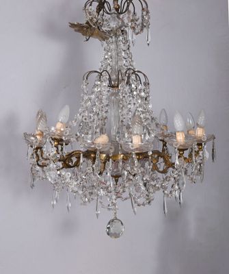 a chandelier hanging from the ceiling in a room