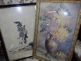 two framed pictures of a vase and a vase with flowers