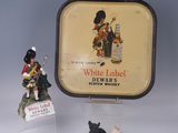 two figurines that are sitting next to each other