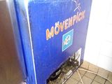 a blue refrigerator with the word movenpick written on it