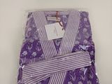 purple and white striped robe wrapped in a purple and white floral pattern