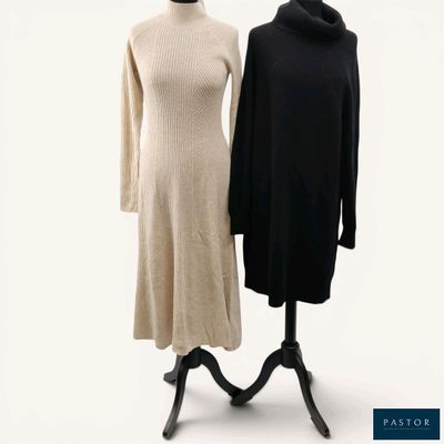 two dresses on a mannequin stand on a white background