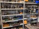 a room filled with lots of tools and a bucket